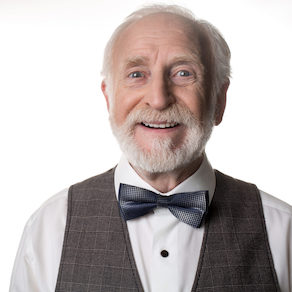 Portrait of kind elegant pensioner wearing bow tie.